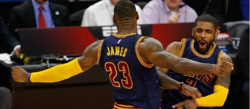 Kyrie Irving and LeBron James helped the Cavs get to the Eastern Conference Finals on Sunday. [Image via Blasting News image library/inquisitr.com]