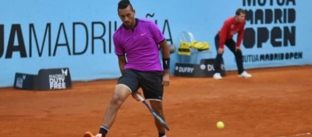 Nick Kyrgios plays a tweener against Marcos Baghdatis at the Madrid Masters. Photo-- Twitter/@MutuaMadridOpen Nick Kyrgios plays a tweener against Marcos Baghdatis at the Madrid Masters. Photo-- Twitter/@MutuaMadridOpen