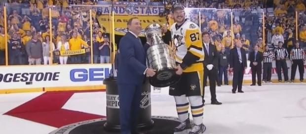 Crosby receives the Stanley Cup, Puck S Youtube channel https://www.youtube.com/watch?v=ueUB6nTI4kY Crosby receives the Stanley Cup, Puck S Youtube channel https://www.youtube.com/watch?v=ueUB6nTI4kY