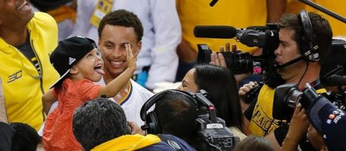 Steph Curry shares NBA champion title with wife and kids. Photo - go.com