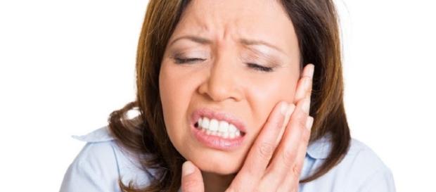 Remedies For Denture Pain | Photo via Esther Max, Flickr Remedies For Denture Pain | Photo via Esther Max, Flickr