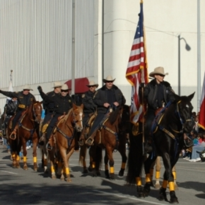 Texas Sheriffs at parade in downtown Houston, TX. / Image by Ed Uthman via Flickr | CC BY-SA 2.0