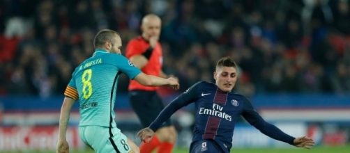 Marco Verratti in tackle su Iniesta