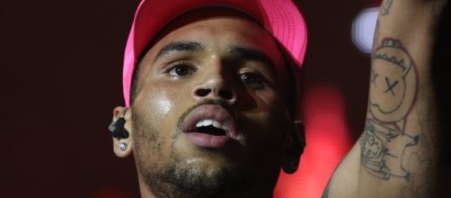 Chris Brown gets some words of wisdom from ex-girlfriend Rihanna. (Wikimedia/Eva Rinaldi)