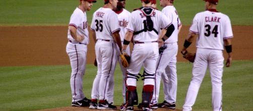 Diamondbacks gather on the mound. Flickr