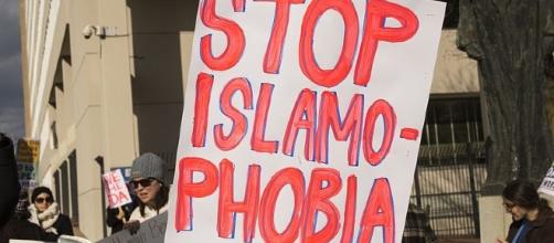 Islamophobia credits:wikimedia https://commons.wikimedia.org/wiki/File:Anti_Trump_immigration_protest_in_Baltimore_DSC_6631_(32445497342).jpg