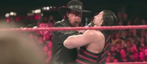 Is The Undertaker set to make a return to avenge his loss to Roman Reigns? [Image via WWE/YouTube]
