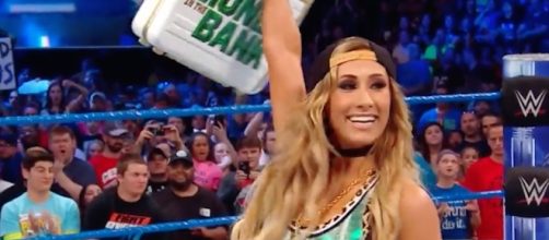 Carmella won the women's 'MITB' ladder match at 'Money in the Bank,' or so she thought. [Image via WWE/YouTube]