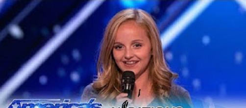 Teen singer Evie Clair tops of "America's Got Talent" with a heartfelt tribute to her dad on a night top-heavy with talent-.Screencap AGT/YouTube