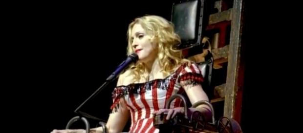Pop diva Madonna is in love with a 31-year old hunk model. Image via YouTube/PopCrush Pop diva Madonna is in love with a 31-year old hunk model. Image via YouTube/PopCrush