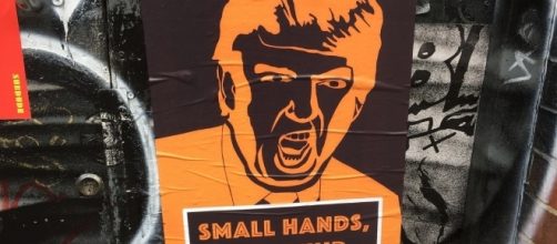Anti-Trump poster [Image by Matt Brown via:https://flic.kr/p/TKwuPy / CC BY 2.0]
