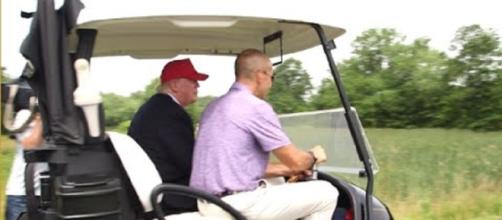 Trump has been filmed several times driving a golf cart on greens. Photo via CNN, YouTube.