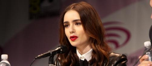 Lily Collins during a press conference (Image by by Gage Skidmore via Flickr.)