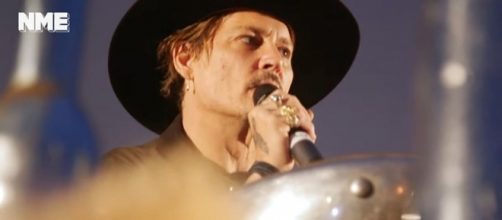Photo Johnny Depp at Glastonbury photo capture from YouTube video/NME
