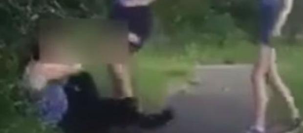Bullies attacking girl, Image via The Lincolnite/YouTube screencap, https://youtu.be/io3FHYrtbFk Bullies attacking girl, Image via The Lincolnite/YouTube screencap, https://youtu.be/io3FHYrtbFk