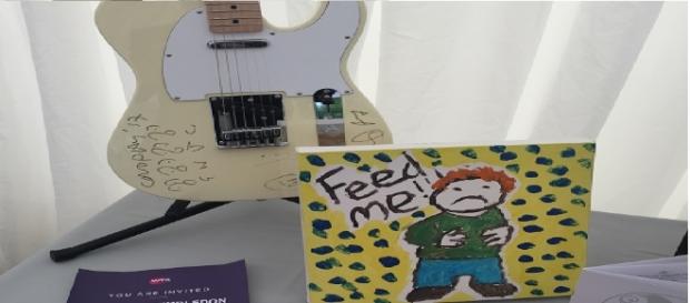 Ed Sheeran donated a picture to the event and Coldplay donated a guitar Ed Sheeran donated a picture to the event and Coldplay donated a guitar