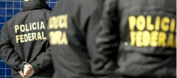 Policiais federais cumpriram mandados da Justiça em cidades de dois Estados brasileiros (Foto: Divulgação/PF) Policiais federais cumpriram mandados da Justiça em cidades de dois Estados brasileiros (Foto: Divulgação/PF)
