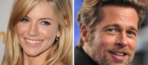 Brad Pitt and Sienna Miller reportedly couldn't stop cuddling at Glastonbury
