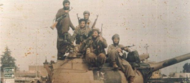 Kurdish troops gleefully poses in the midst of an offensive against ISIS - Wikipedia - wikipedia.org Kurdish troops gleefully poses in the midst of an offensive against ISIS - Wikipedia - wikipedia.org