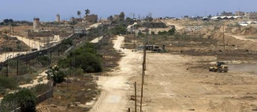 Hamas-affiliated websites posted images of bulldozers in the initial stages of construction. [Image via National Post/nationalpost.com]