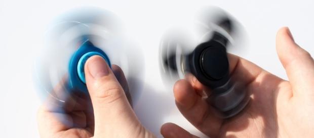 Photo fidget spinners via Pixabay by Myriams-Photos / CC0 Photo fidget spinners via Pixabay by Myriams-Photos / CC0