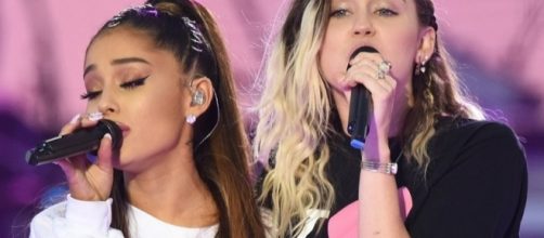 Ariana Grande and Miley Cyrus singing 'Don't Dream It's Over' during 'One Love Manchester' concert. (Photo: toofab.com)