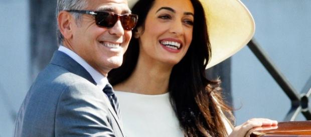 Amal and George are certified parents to twins Ella and Alexander. Photo - eonline.com Amal and George are certified parents to twins Ella and Alexander. Photo - eonline.com