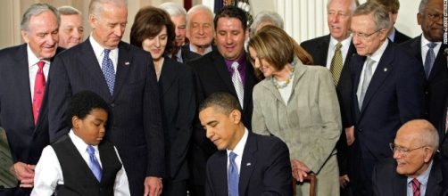 Former Pres. Obama signs Affordable Healthcare into law (Photo US government)