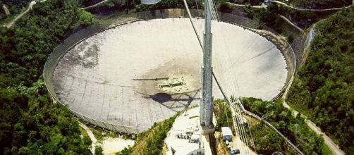 The Arecibo Radio Telescope. Photo credit: H. Schweiker via wikimedia.org.