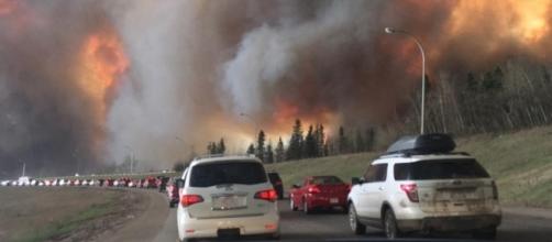 Photo shows the 2016 Fort McMurray Wildfire, mentioned in the article ( Wikipedia - wikipedia.org)