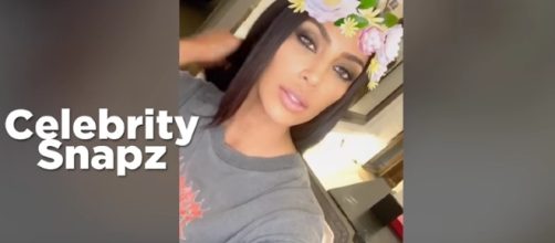 Kim Kardashian claps down accusations of cocaine on her recent SnapChat video. Image via YouTube/CelebritySnapz