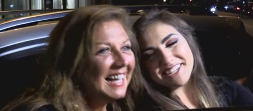 Abby Lee Miller headed in to prison to start her 366-day sentence. Image via YouTube/Enews