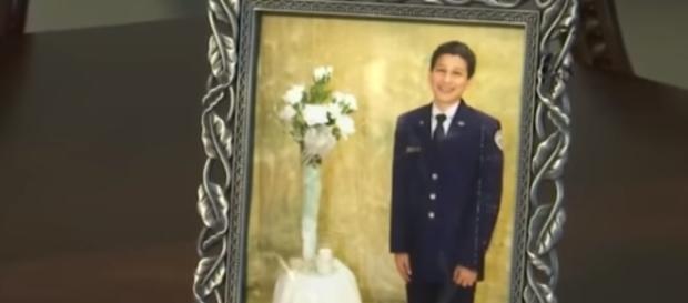 Isaiah Gonzales in a photo displayed in their home - YouTube/LoneWolf & The Three Muskadoggies(◑_◑) Isaiah Gonzales in a photo displayed in their home - YouTube/LoneWolf & The Three Muskadoggies(◑_◑)