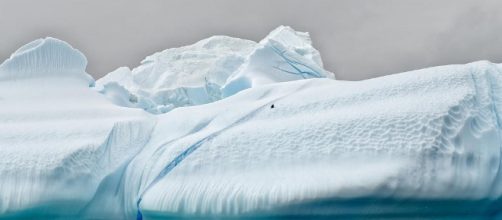 Antarctica iceberg breaks / Photo via Christopher Michel, Flickr