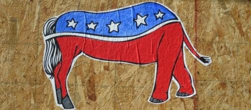 Bipartisan artwork of GOP and Dem party mascots / [Image by Daniel Lobo via Flickr, Public Domain]
