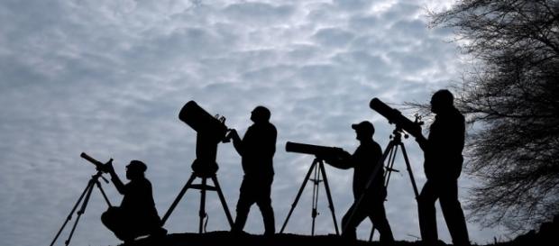 Scientists, stargazers and backyard-astronomers all view this extraordinary event - Image via sunset.com Scientists, stargazers and backyard-astronomers all view this extraordinary event - Image via sunset.com