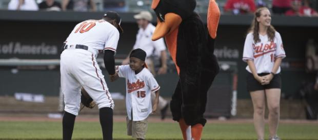 Zion Harvey throwing out the ceremonial first pitch. Zion Harvey throwing out the ceremonial first pitch.