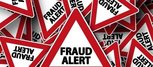 Scam alert poster credits:pixbay https://pixabay.com/en/road-sign-attention-note-scam-464641/
