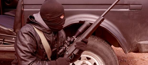 Faceof a modern terrorist replete with rifle.https://pixabay.com/en/criminal-terrorist-rifle-weapons-1563428/ Faceof a modern terrorist replete with rifle.https://pixabay.com/en/criminal-terrorist-rifle-weapons-1563428/
