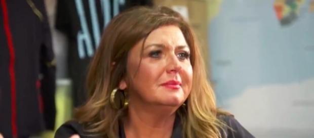 Abby Lee Miller is showing her weak side after surrendering to prison for her fraud charges. (via YouTube - KidsUniverseHD) Abby Lee Miller is showing her weak side after surrendering to prison for her fraud charges. (via YouTube - KidsUniverseHD)