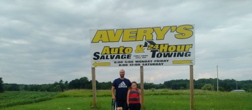 Supporters in front Of Avery Auto Salvage sign/photo credit Dana L Weinert/Facebook