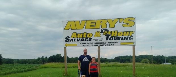 Supporters in front Of Avery Auto Salvage sign/photo credit Dana L Weinert/Facebook Supporters in front Of Avery Auto Salvage sign/photo credit Dana L Weinert/Facebook