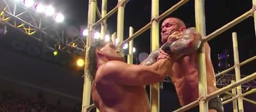 The Great Khali returned during the Punjabi Prison match to prevent Orton's escape. [Image via WWE/YouTube]
