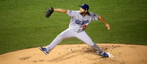 Dodgers starter Clayton Kershaw delivers a pitch during NLCS Game 6 by Arturo Pardavila III from Hoboken, NJ, USA via Wikimedia Commons