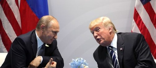 Vladimir Putin and Donald Trump meet at the 2017 G-20 Hamburg Summit. - kremlin.ru/Wikimedia Commons