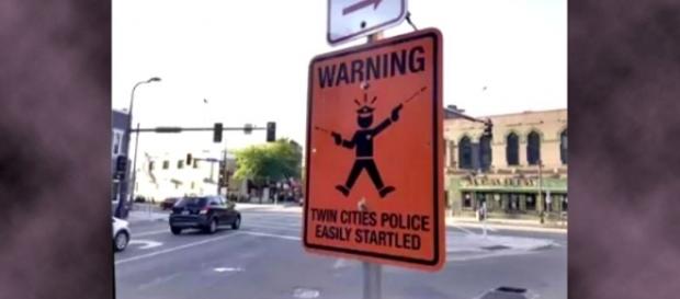 Photo "Twin Cities Police easily startled" sign screen capture from YouTube/Viral Videos 24/7 Photo "Twin Cities Police easily startled" sign screen capture from YouTube/Viral Videos 24/7