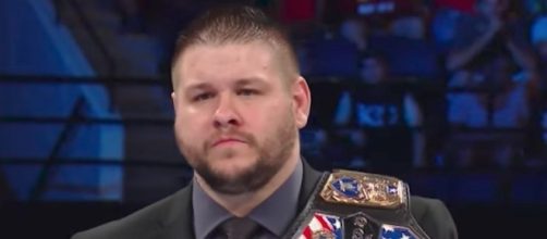 United States Champion Kevin Owens was forced to defend his title in a triple threat on Tuesday's 'SmackDown Live.' [Image via WWE/YouTube]