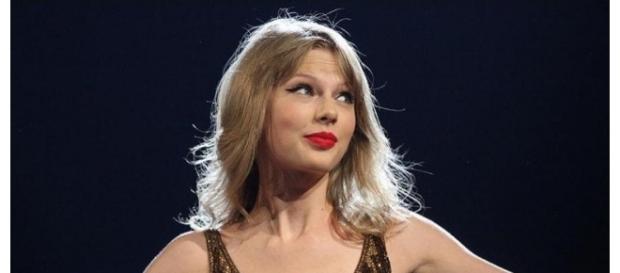 TaylorSwift attends trial against ex-DJ David Mueller (Image by Wikimedia Commons} TaylorSwift attends trial against ex-DJ David Mueller (Image by Wikimedia Commons}