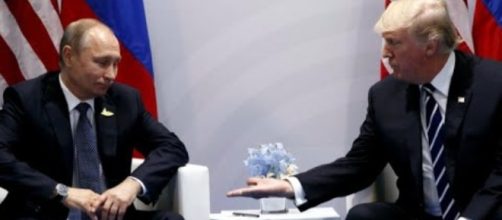 Putin and Trump discussing during G20 (via YouTube- CBS News)