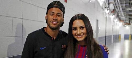 Neymar y Demi Lovato durante la gira del Barcelona por EE.UU.